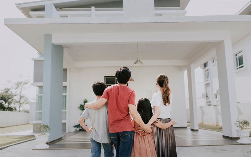Couple Proudly Embracing Their New Home