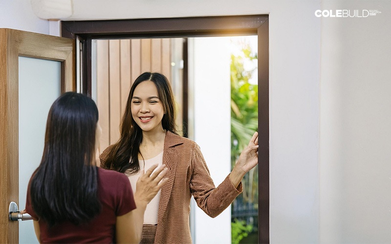 Singaporean neighbours greeting each other