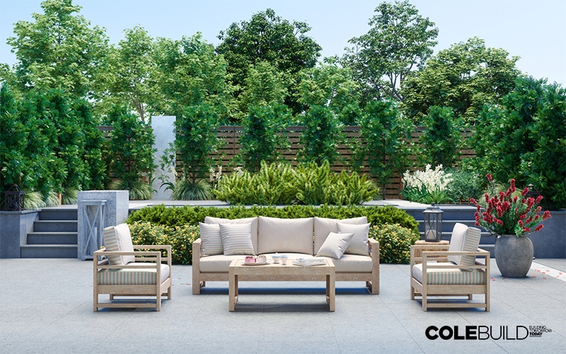 Modern Patio With Sofa, Armchairs, Coffee Table And Garden View Background