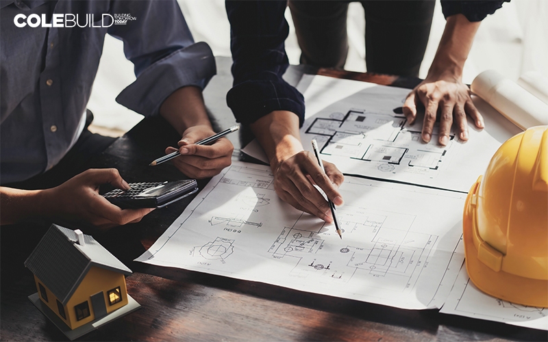 men planning for a blueprint
