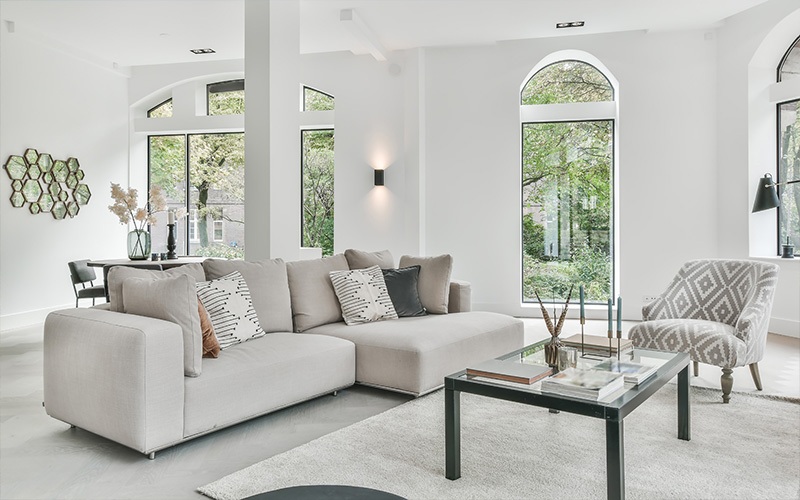 Neutral coloured living room decorated with furniture