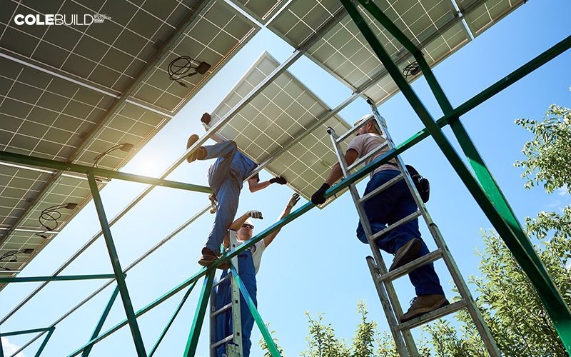 people installing solar panels